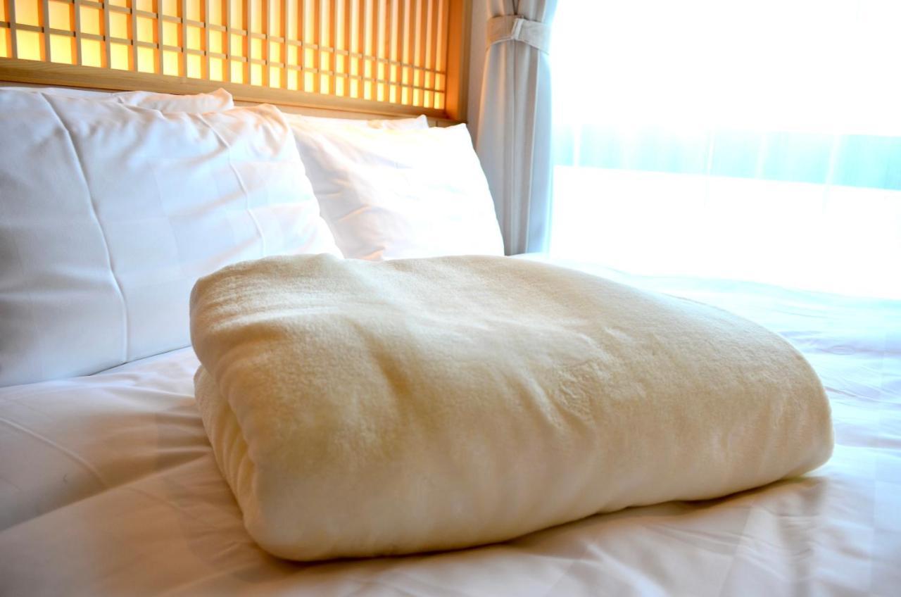โรงแรม Henn Na Premier Gojo Karasuma -formerly Watermark Kyoto-